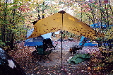 The "Living Room", and behind it to the left the tent and to the right the screen house.